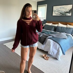Maroon lace-up sweater size L